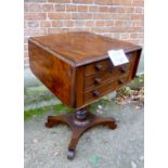 A pretty Victorian mahogany drop leaf work table with two drawers to one end over a turned column