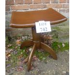 A 20th century small mahogany swivel stool with solid seat est: £20-£40
