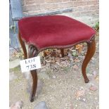 A 19th century mahogany stool upholstered in red material and in clean condition est: £30-£50