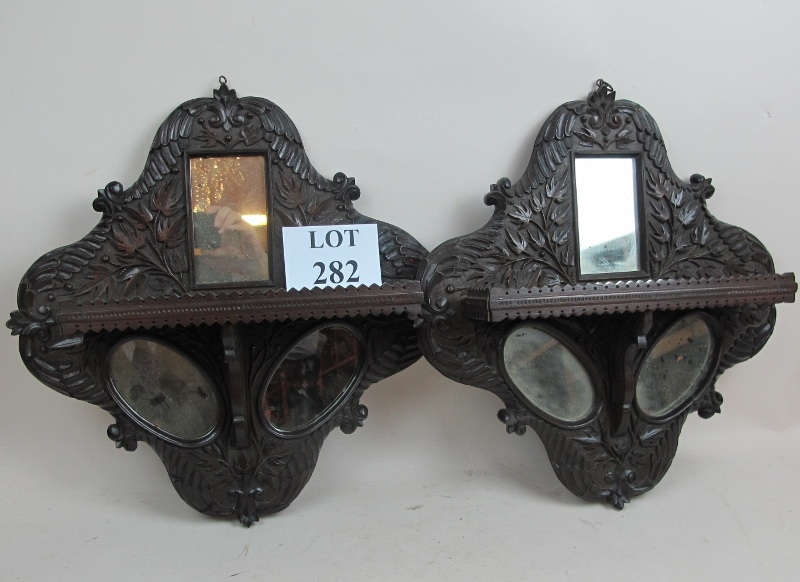 A pair of late 19th century carved woode