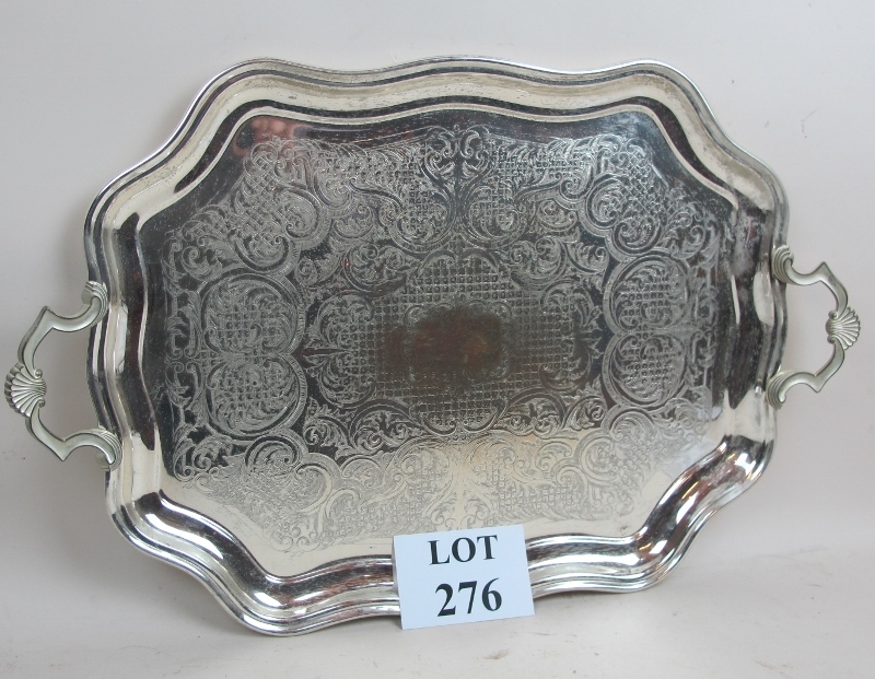 A large silver plated tray est: £25-£45
