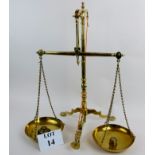 A set of Victorian brass balance scales by W & G Pearce, 56 cm high,