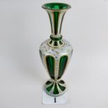 A 19th century Bohemian flashed glass vase with gilt decoration throughout,