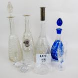 Glassware, to include a Bohemian blue-flashed decanter with stopper, a tall cut decanter with .