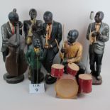 An Art Deco style five piece Jazz Band, later resin,