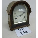 An early 20th century Gustav Becker oak cased mantel clock,