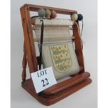 A vintage pine shop-display model loom,