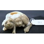 A Japanese Meiji period carved ivory pot in the form of a wild cat and a monkey,