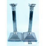 A pair of good quality early 20th century Elkington & Co silver plated candlesticks in the form of