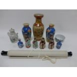 A Group of Oriental ceramics inc figures, vases etc,and a painted scroll.