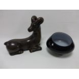 Large bronzed ceramic figure of a resting Ibex length 32cm, height 29cm,