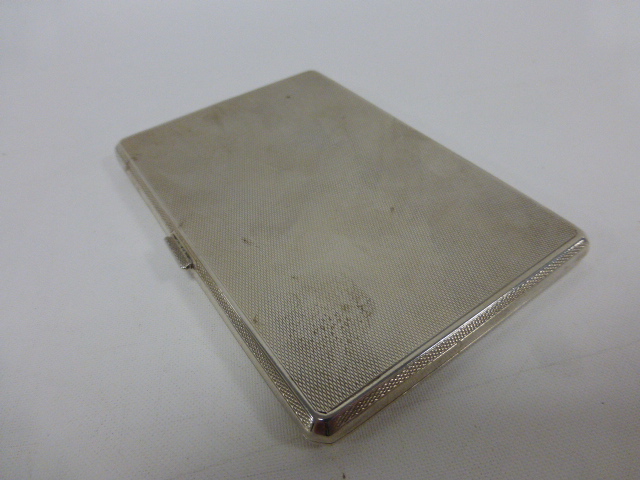 A quality silver cigarette case with engine turned decoration, hallmarked London 1930, - Image 4 of 4