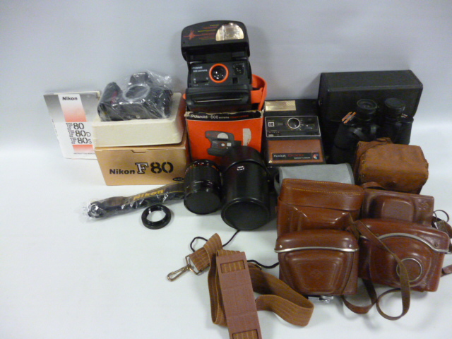 Collection of nine cameras and lens including Nikon F80 Body in original box with paperwork,