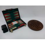 Cased Backgammon and wooden Solitaire game.