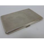 A quality silver cigarette case with engine turned decoration, hallmarked London 1930,