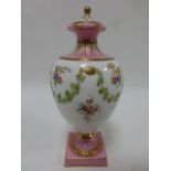 Wedgwood 22cm urn jar with cover, raised on square base,