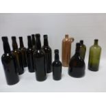 Collection of thirteen assorted 19th Century wine & Gin bottles.