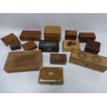 Collection of fourteen wooden boxes.