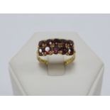 18ct gold ring set with two rows of five Rubies, stamped 750, size P.