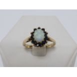 9ct gold Opal and Sapphire ring, size P.