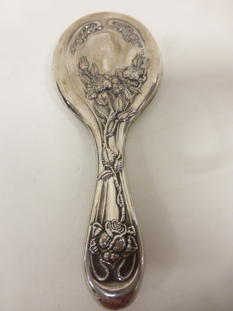 Edwardian silver backed mirror with embossed Art Nouveau floral design and a silver topped glass - Image 2 of 4