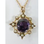 Edwardian 9ct gold Amethyst and seed pearl pendant necklace, the pendant measuring 23mm in diameter,