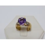 18ct gold Amethyst and Diamond ring with wide band, size M/N.