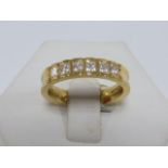 18ct gold Diamond ring, set with six princess cut diamonds, size N.