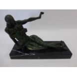 Cast bronze of a faceless, contorted human figure with chest of drawers torso, patinated finish,