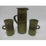 Tony Gant studio pottery 22cm jug and pair of matching tall mugs.