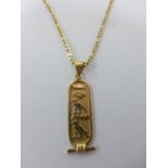 An Egyptian 18ct gold pendant on a 14ct gold 20" figaro chain necklace with 9ct gold replacement