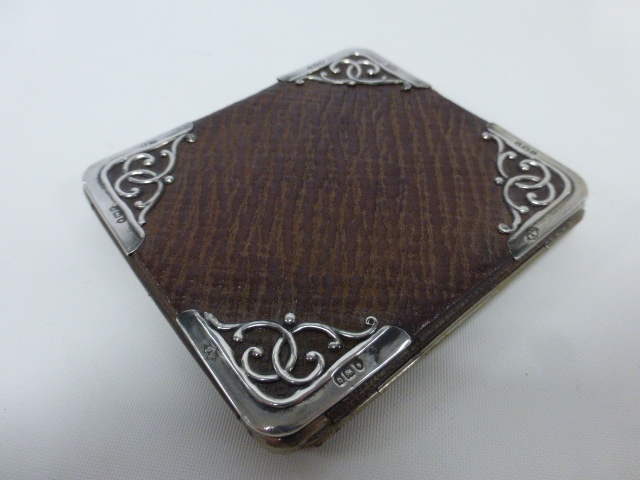 Edwardian leather wallet with silver mounts, hallmarked London 1903, 9x10cms.