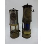 Two Miners lamps - Protector Type 6 and Ackroyd & Best No336 with blue glass.