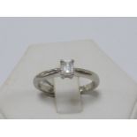 Platinum solitaire Diamond ring, with emerald cut diamond, size N.