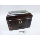 Good early 19thC Regency tortoiseshell tea caddy with serpentine shaped front and back and ivory