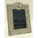 Silver photograph frame hallmarked Sheffield 1992, makers initials RBB,16.5x23cms.
