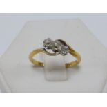 22ct gold and platinum three stone Diamond ring, size O.