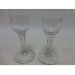 Two 18th Century wine glasses with faceted stems, 12.5cm and 13cm in height.