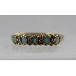 AN OPAL AND DIAMOND HALF HOOP RING, set with five small oval opals interspersed with four sets of