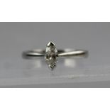 A LADY'S SOLITAIRE RING, having marquise cut stone, the platinum shank stamped 950, size L