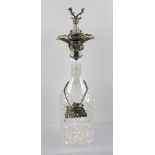 G.R. COLLIS & CO. A SILVER MOUNTED CUT GLASS DECANTER, having hallmarked double pouring spout with