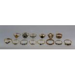 A SELECTION OF FOURTEEN GOLD DRESS RINGS, set with various stones