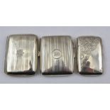T. HEATLEY A MID 20TH CENTURY SILVER CIGARETTE CASE, Birmingham 1942, together with TWO OTHER