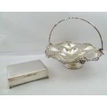 A SILVER PLATED FRUIT DISH, with cast swing handle, on a circular platform base, 32cm diameter,