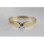 A 14CT GOLD SOLITAIRE RING, size N 1/2, weight 2g.