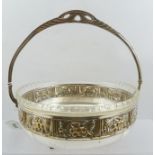 A SILVER PLATED W.M.F. STYLE FRUIT BASKET, with cast pierced handle and glass liner, an embossed