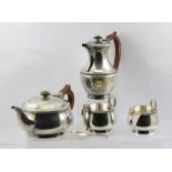 J B CHATTERLEY & SONS LTD A GEORGIAN DESIGN FOUR PIECE SILVER TEA SET, comprising tea pot, lidded