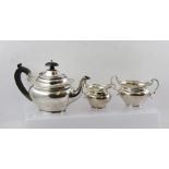 ELKINGTON AND CO. AN EARLY 20TH CENTURY SILVER THREE PIECE BACHELOR TEASET comprising; teapot, sugar