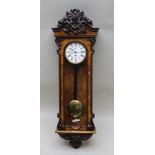 A 19TH CENTURY GERMAN VIENNA STYLE WALL TIMEPIECE, having 8-day spring driven mechanism low swan
