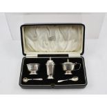 ADIE BROTHERS A THREE PIECE SILVER CONDIMENT SET comprising; pepper pot, salt and lidded mustard,